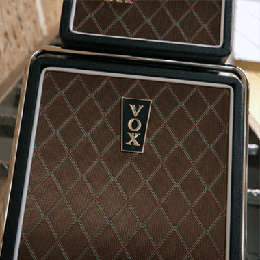 brown and black VOX amplifier