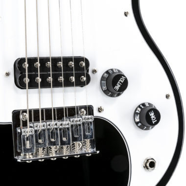 closeup of controls on black VOX electric guitar