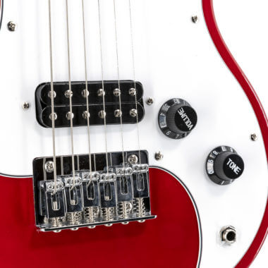 closeup of body of VOX electric guitar