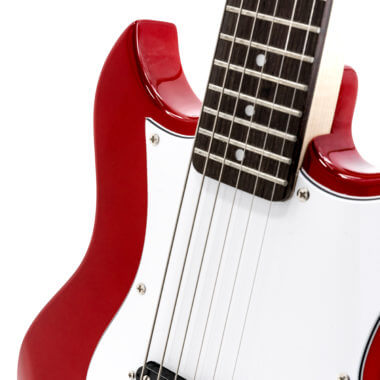 closeup of red VOX mini electric guitar