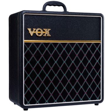 front of black VOX amplifier
