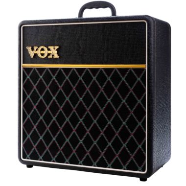 front of black VOX amplifier