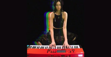 woman playing VOX keyboard
