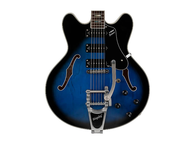body of black and blue electric guitar