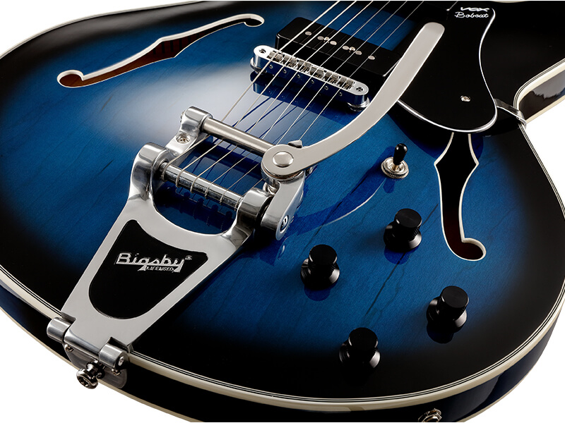 body of blue and black electric guitar