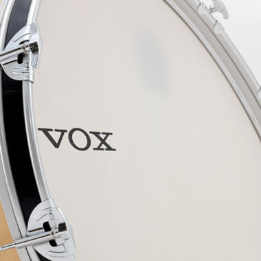 closeup of VOX logo on drum set