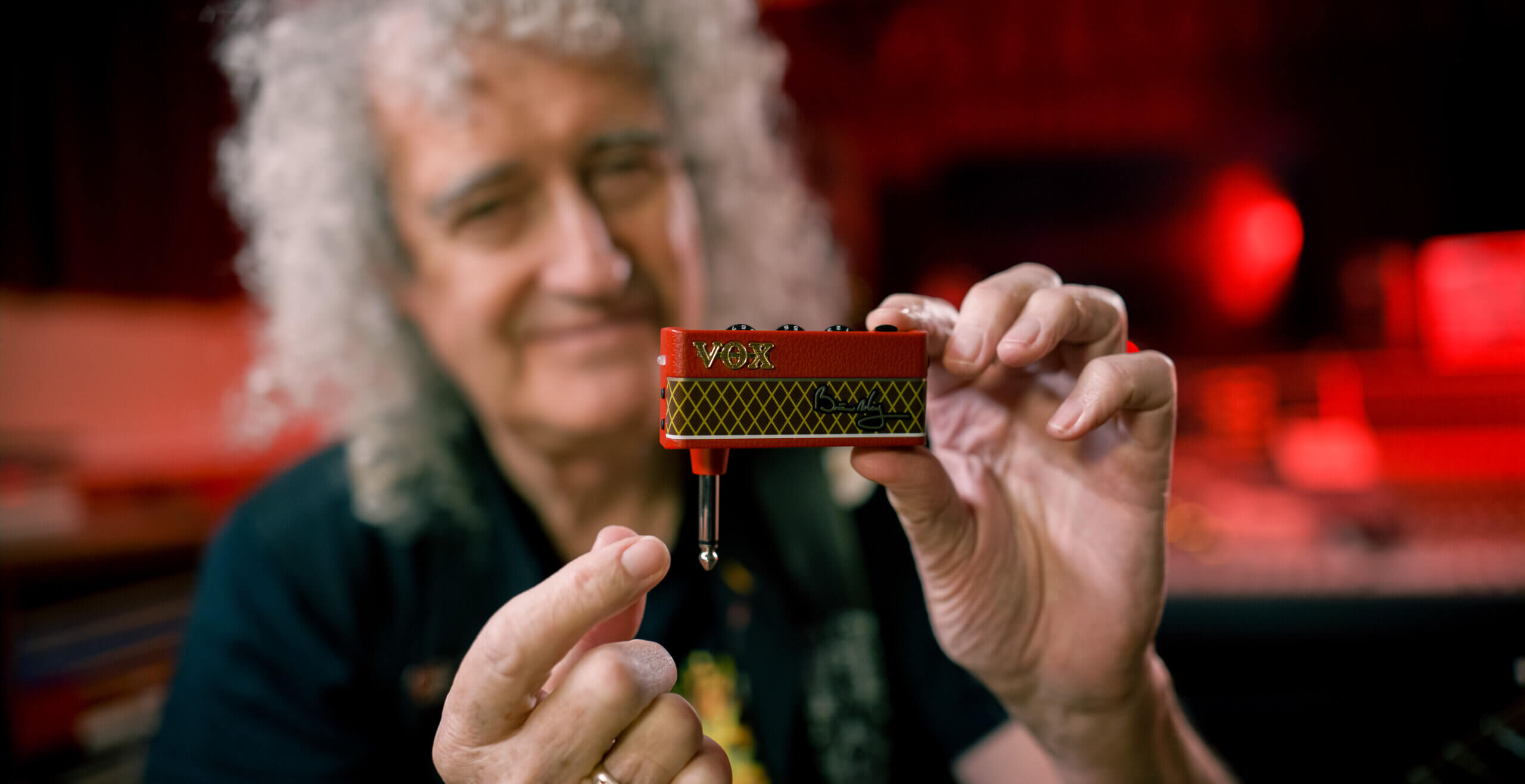 Brian May holding the new Limited Edition amPlug from VOX