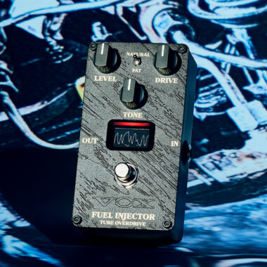 Vox Valvenergy Fuel Injector Tube Overdrive Guitar Effects Pedal on black and blue background