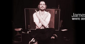 artist, James Petralli, sitting in front VOX amplifie