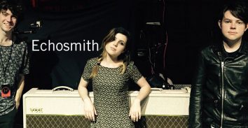 band members of Echosmith standing in front of VOX amplifiers