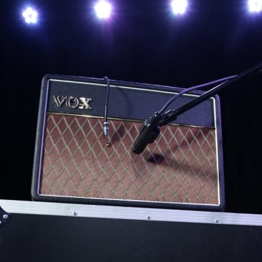 microphone pointed towards VOX amplifier