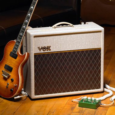 electric guitar leaning against VOX amplfier