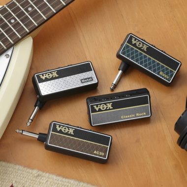 four VOX AmPlugs between VOX electric guitar and headphones