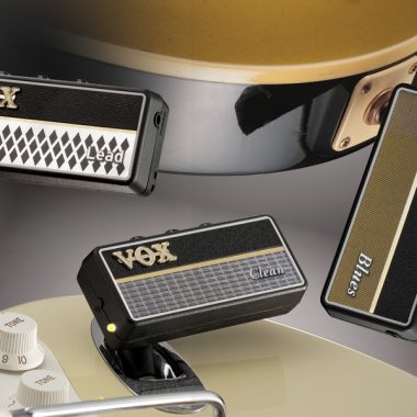 three VOX AmPlugs plugged in to electric guitars