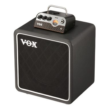 VOC AC tube head on top of VOX guitar amplifier