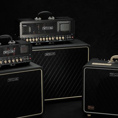 three black VOX amplifier