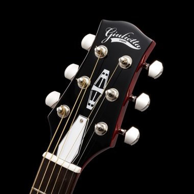 closeup of headstock on VOX electric guitar